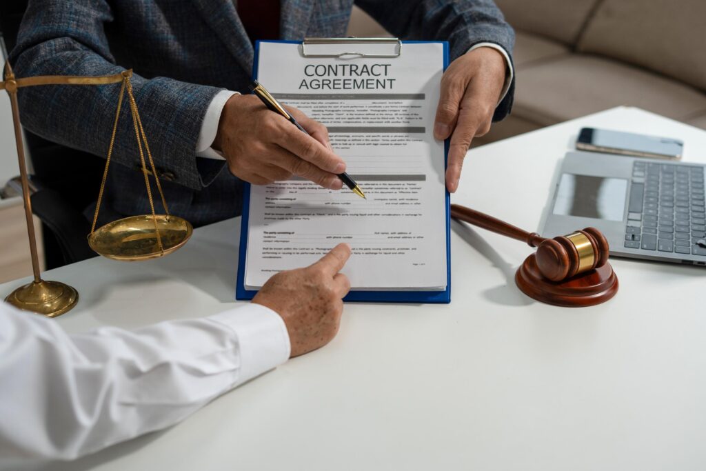 Contract Agreement Review with Legal Professionals Indoors